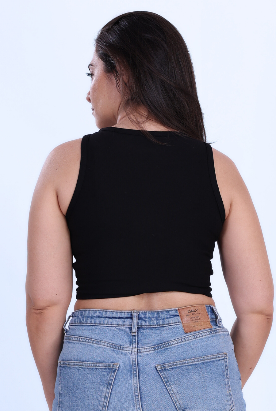 Back view Image of model wearing Tank top sewing pattern pieces on white background, ideal for women and girls who love sustainable fashion