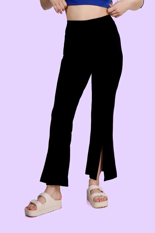 Close-up of black high-waisted flared pants with front slits. Digital sewing pattern available in multiple sizes with A0, A4, Letter, and projector files.
