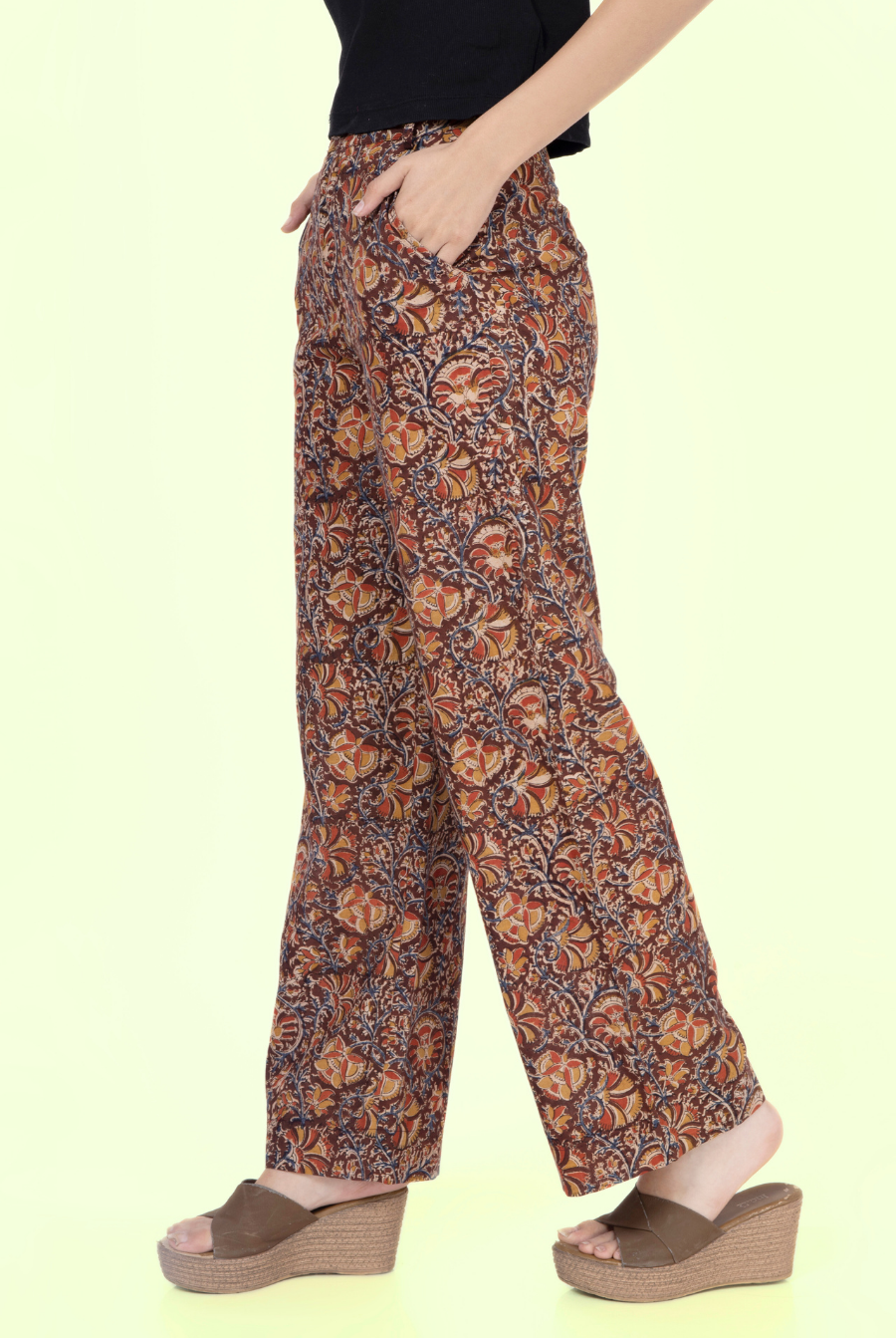 Side view of Maya wide-leg pants showcasing pocket details and relaxed fit. Ideal for sewing enthusiasts looking for a chic, comfortable style.