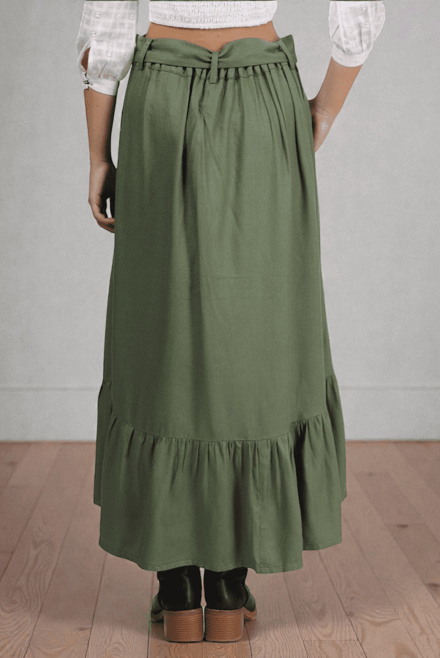 Back view of cottagecore maxi skirt showing elastic waistband and ruffled hem, made from the 'Maple' PDF sewing pattern for women.