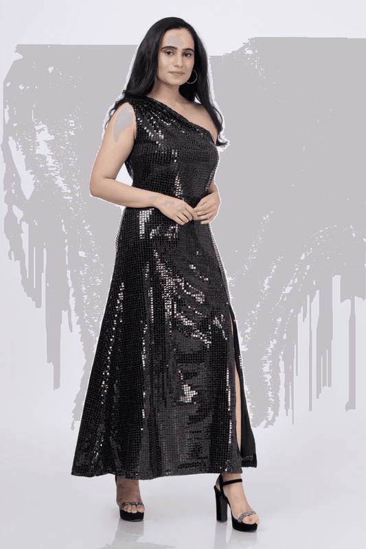 Audrey one-shoulder maxi dress sewing pattern in black sequin fabric with thigh slit, ideal for prom, party, or formal evening occasions.
