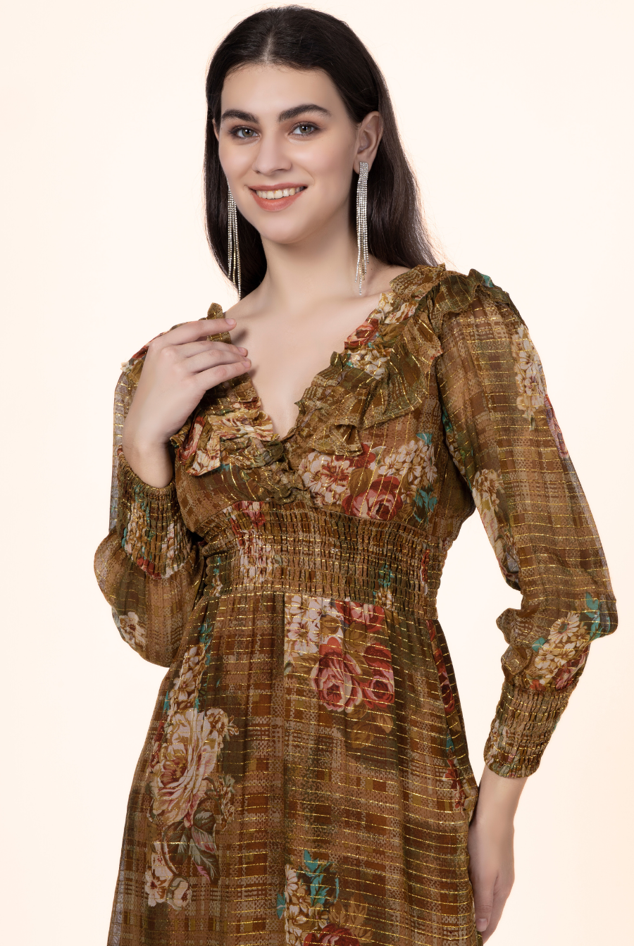 Close-up of the Daisy Maxi Dress highlighting the shirred waist, ruffled V-neckline, and floral fabric. A stylish sewing pattern for dressmakers.