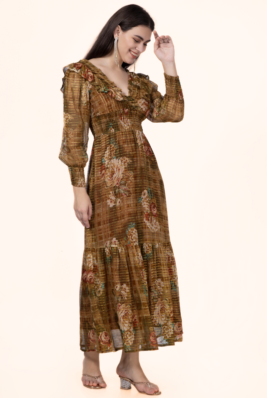 Model in a side pose wearing the Daisy Maxi Dress, emphasizing its flowy silhouette and vintage floral design. Great for handmade wardrobe additions.