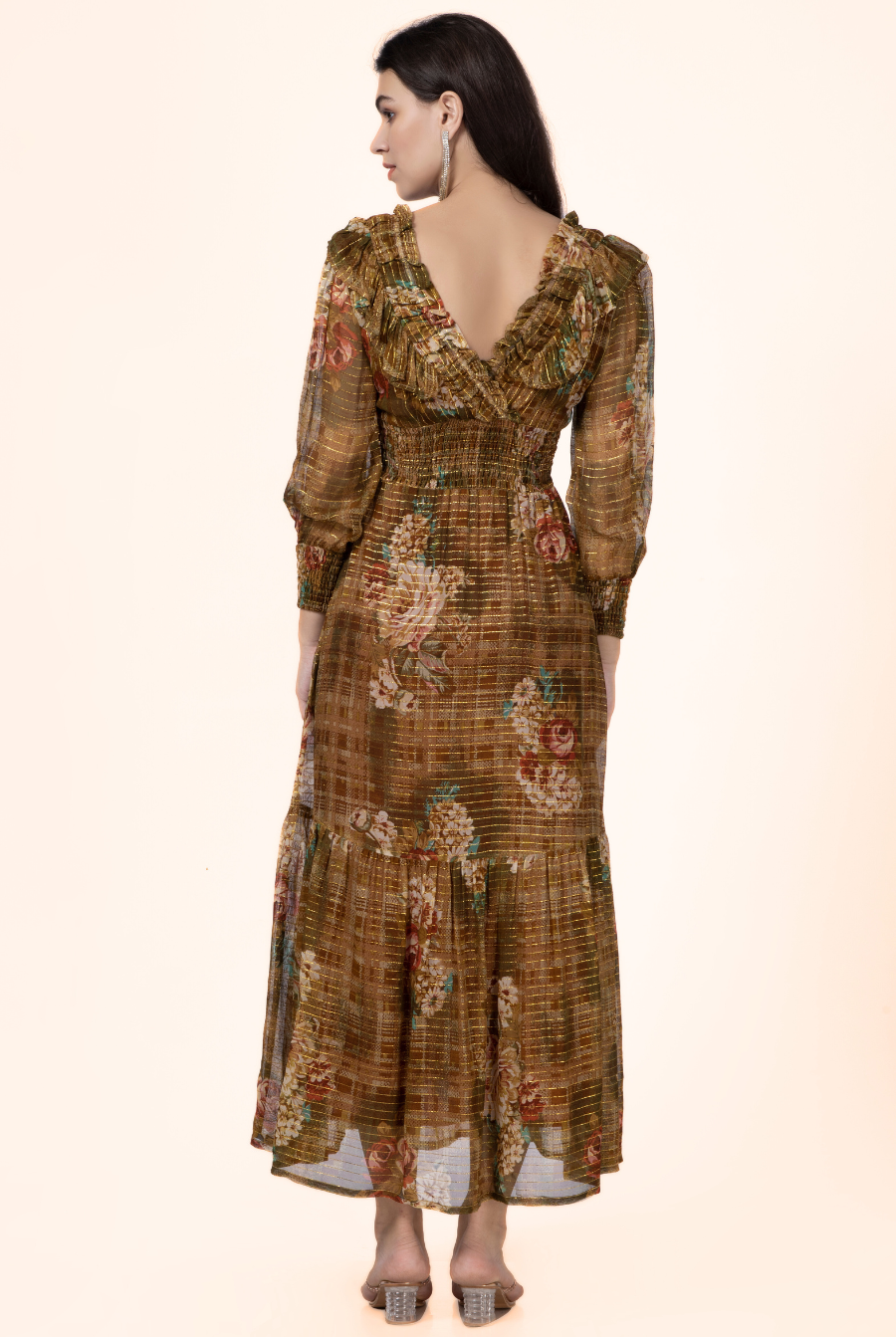 Back view of the Daisy Maxi Dress displaying the deep V-back, ruffled details, and tiered skirt. A must-have sewing pattern for elegant dresses.