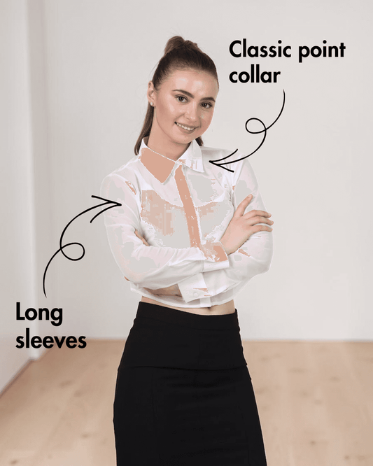 Model wearing white cropped shirt with classic collar and long sleeves