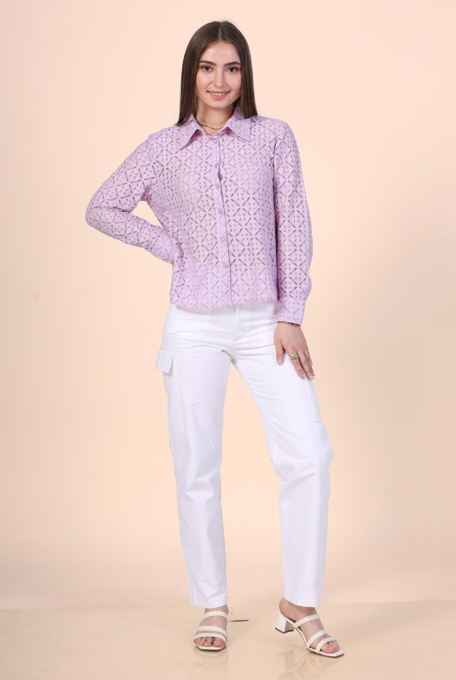 a woman wearing a purple shirt made from winslet's button down shirt sewing pattern and white pants
