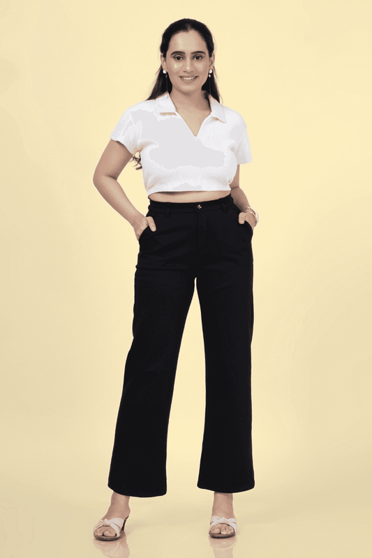 Beginner-friendly crop polo shirt sewing pattern 'Echo' modeled in white knit fabric with sharp collar and short sleeves.