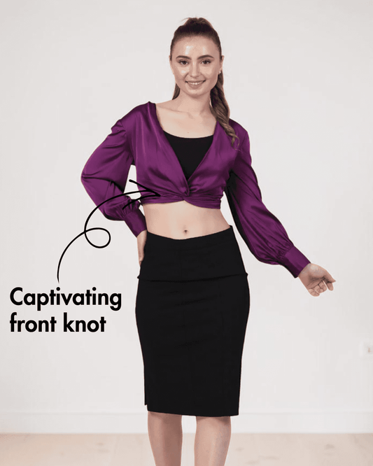 Model wearing purple satin ruched twist front crop top with long bishop sleeves