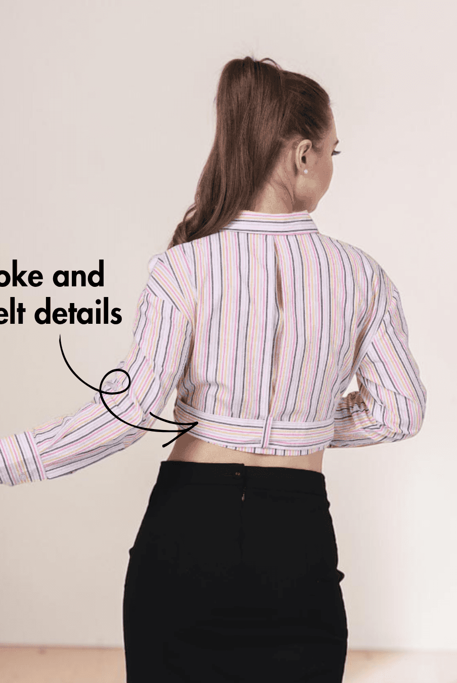 Back View of women's plaid belted cropped shirt with collar, buttons, and belt detail