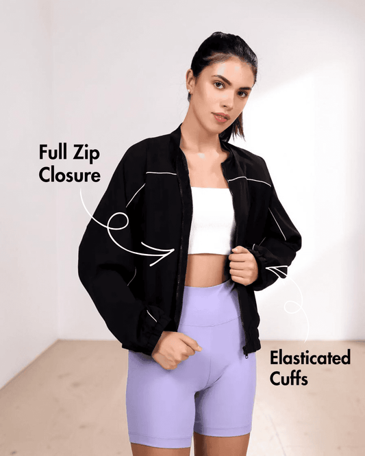 Back view of women's windbreaker jacket Naomi with elastic hem sewing pattern