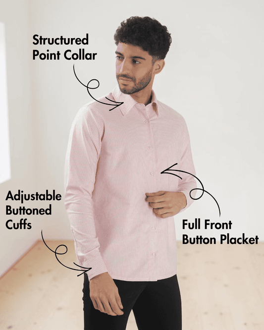 Men's pink striped dress shirt featuring adjustable buttoned cuffs and structured back yoke sewing pattern