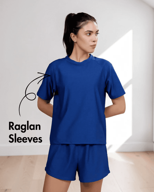 Blue women's activewear T-shirt with raglan sleeves and relaxed fit, suitable for sewing patterns