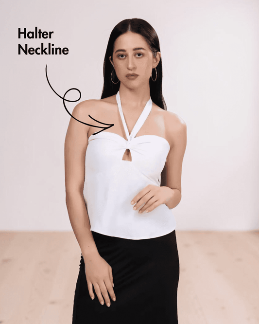 Model wearing white halter top with backless smocked back, close-up of halter neckline