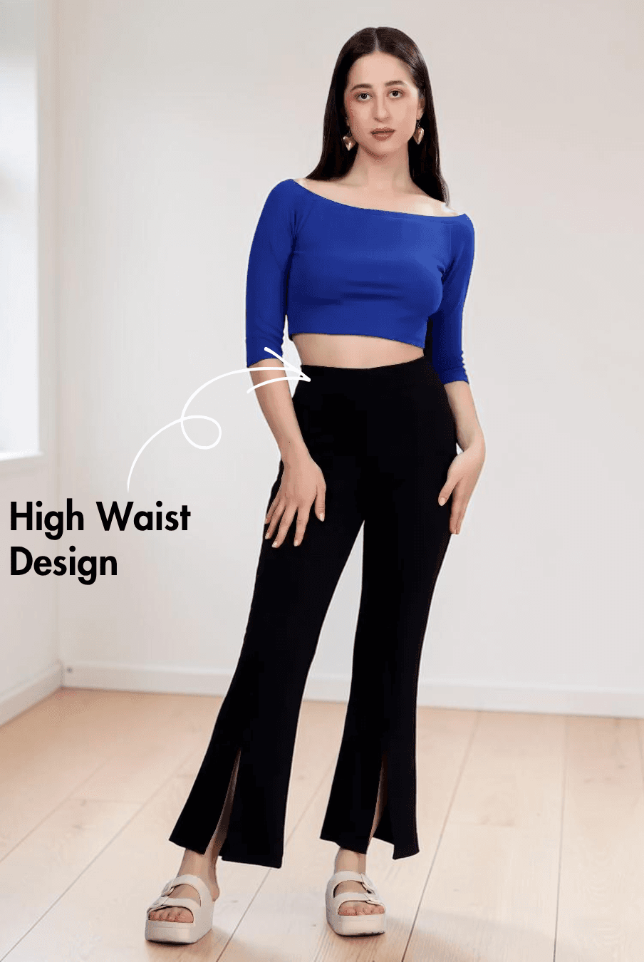 Model wearing black bell bottom pants with front slits and high waist sewing pattern