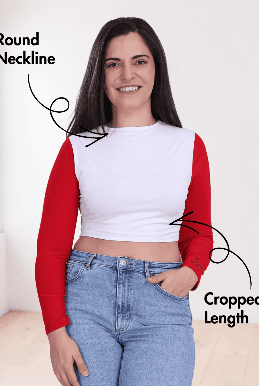Woman wearing long sleeve crop top with round neckline and cropped length