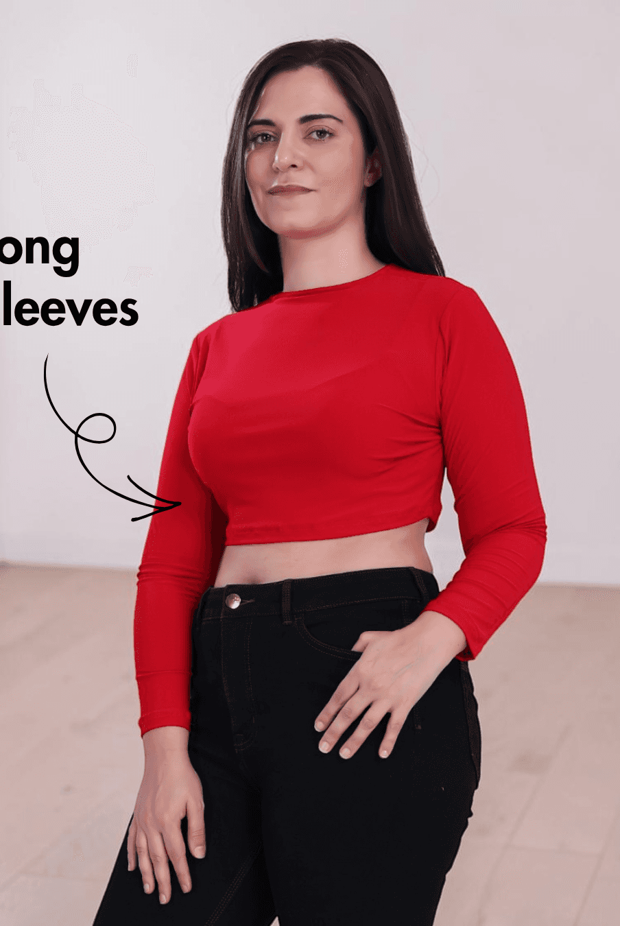 Close Up of Woman wearing long sleeve crop top with round neckline and cropped length