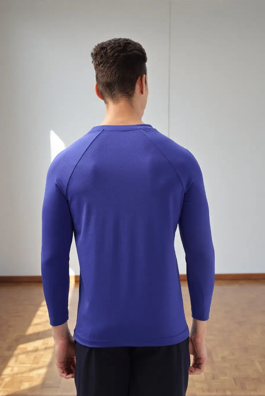 Back view of Men's Raglan T-shirt Sewing Pattern 'Luke' displaying raglan sleeve construction and fitted back design.