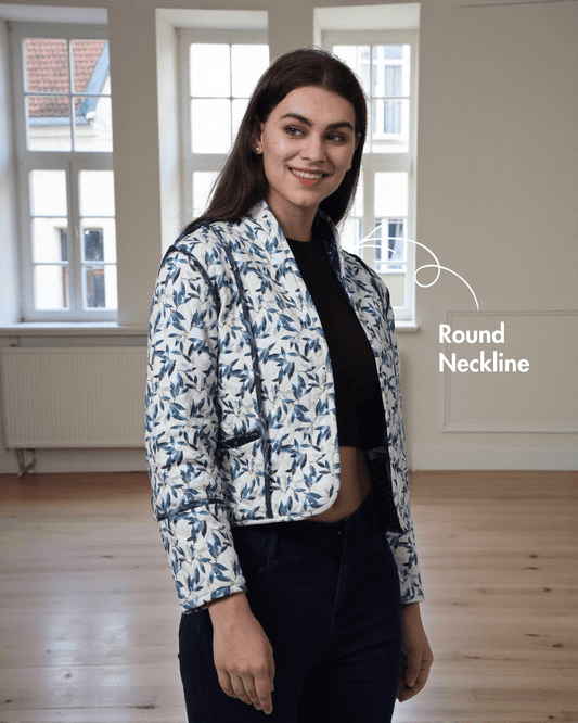 Close-up of Romy reversible quilted jacket sewing pattern showing round neckline and floral print, ideal for fall and winter outerwear projects.