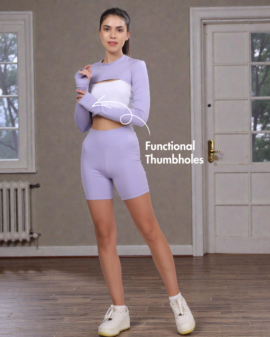 Cropped bolero shrug sewing pattern with functional thumbholes and fitted long sleeves, ideal for bodycon outerwear projects.