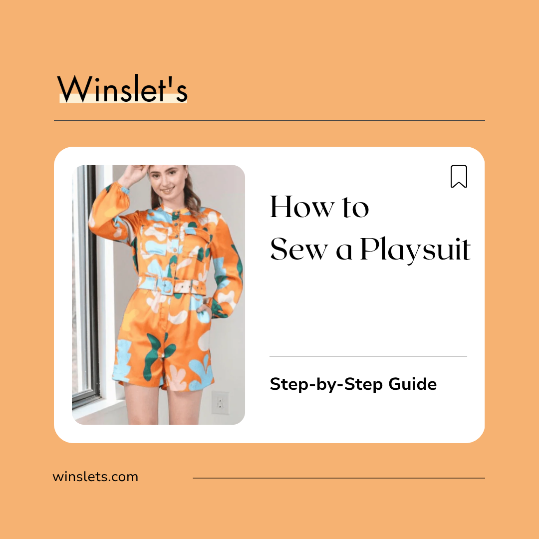 Woman wearing the Winslet's Jade Playsuit Pattern featuring a button-down front, structured collar, long sleeves with elastic cuffs, front patch pockets with flaps, matching waist belt, belt loops, and tailored shorts.