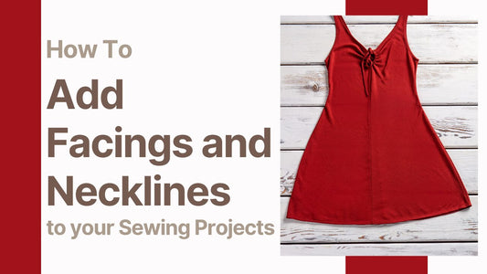 Red sleeveless dress with facing and neckline details on wooden background.