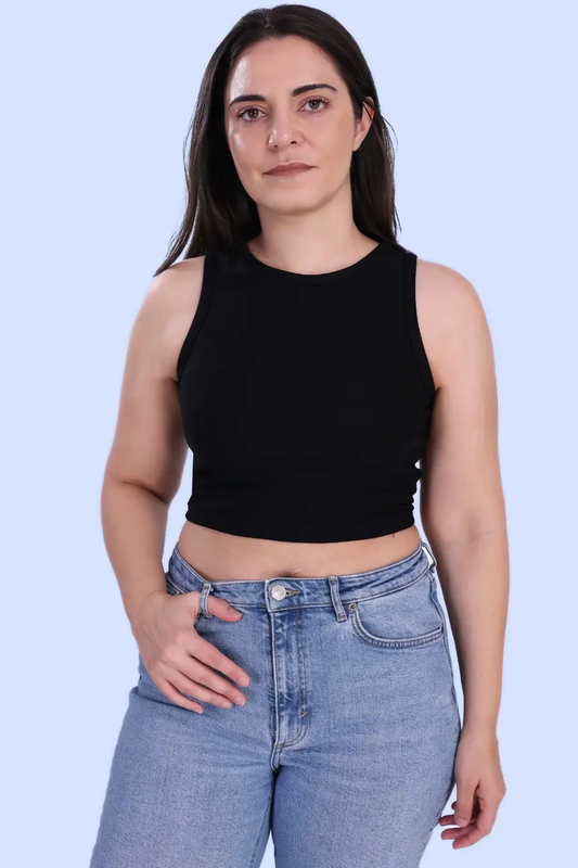 a woman wearing a black bodycon crop top sewed with Winslets patterns and jeans