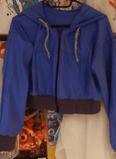 Blue zip-up hoodie with hood and drawstrings, suitable for sewing or crafting projects