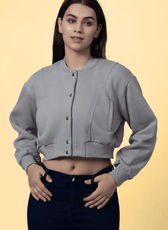 Stylish bomber jacket made using the 'Raya' sewing pattern, featuring a cropped fit, ribbed accents, and a button-up front.