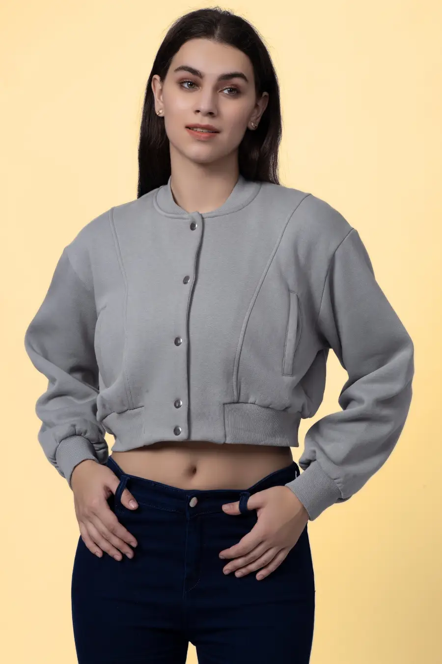 Stylish bomber jacket made using the 'Raya' sewing pattern, featuring a cropped fit, ribbed accents, and a button-up front.