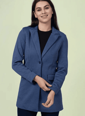 Close-up of the 'Camille' straight-cut coat sewing pattern. The tailored design includes a single-breasted closure, structured shoulders, and flap pockets.