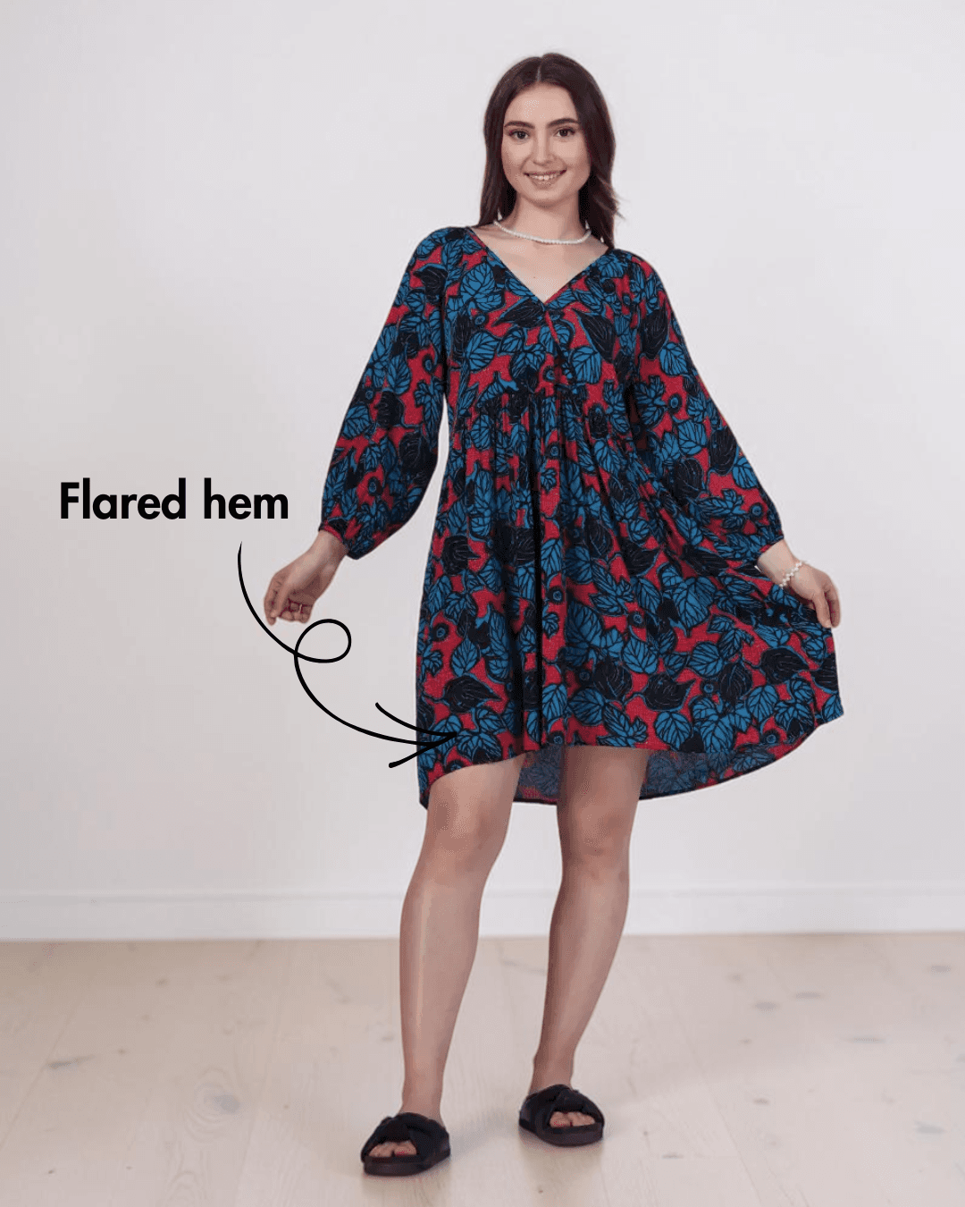 who is the polka dot dress lady The Evette Navy Polka Dot Zip Front Midi Dress main image 1