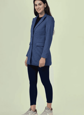 Side view of the 'Camille' straight-cut coat sewing pattern. The structured coat features a tailored fit, single-breasted closure, and notched lapel.