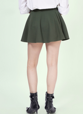 Back view of the 'Poppy' skater skirt sewing pattern. Showcases the flared design and structured waistband for a flattering silhouette.