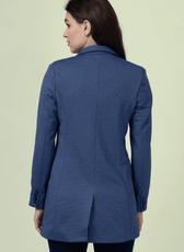 Back view of the 'Camille' straight-cut coat sewing pattern. The design includes a center-back vent, structured shoulders, and a tailored fit for a polished look.