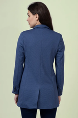 Back view of the 'Camille' straight-cut coat sewing pattern. The design includes a center-back vent, structured shoulders, and a tailored fit for a polished look.