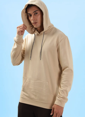 Men's hoodie with hood up, made using the 'Atlas' sewing pattern. Features a relaxed fit, drawstring hood, and kangaroo pocket for a cozy design.