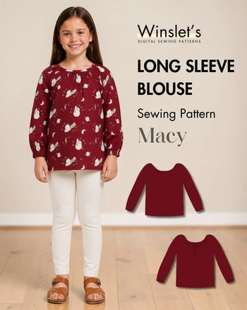 Young girl wearing a red long sleeve blouse with a snowman and moon pattern, elastic gathered neckline, and white pants, standing indoors.