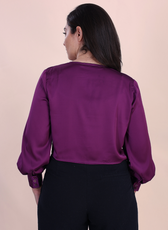 Back view of the Front Knot Top 'Willow' in purple satin, showing the smooth finish and elegant long sleeves with buttoned cuffs.