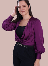 Model wearing the Front Knot Top 'Willow' with black trousers, showcasing its flattering fit and stylish long sleeves with buttoned cuffs.