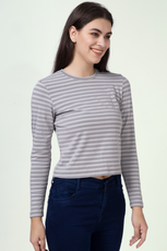 Close-up of a model in a striped long sleeve t-shirt made using the 'Misha' sewing pattern. Features a clean round neckline and a comfortable fit.