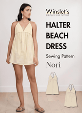 Yellow halter beach dress sewing pattern with plunging V-neckline and gathered empire waist