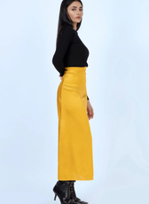 Profile view of the 'Marigold' A-line skirt in mustard yellow. A sleek, high-waisted design that flares gently for an elegant silhouette.