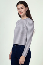 Side profile of a model wearing a striped long sleeve t-shirt from the 'Misha' sewing pattern. A timeless design perfect for casual and layered outfits.