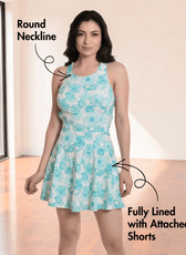 Women's swimwear dress with attached shorts and practical pockets