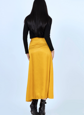 Back view of the 'Marigold' A-line skirt sewing pattern. Features a smooth waistband and a flowing silhouette for a timeless look.