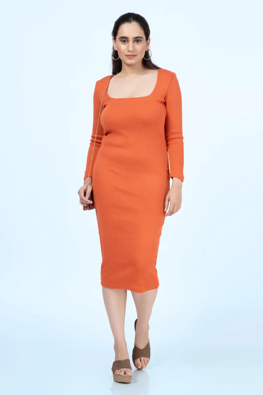 Model wearing the 'Finch' Bodycon Midi Dress, a fitted long-sleeve midi dress with a square neckline. Elegant and versatile sewing pattern by Winslet's Patterns.