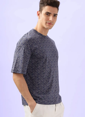 Side view of the Men's Oversized T-shirt 'Archie' showcasing its loose fit and dropped shoulders. A stylish and comfortable sewing pattern.