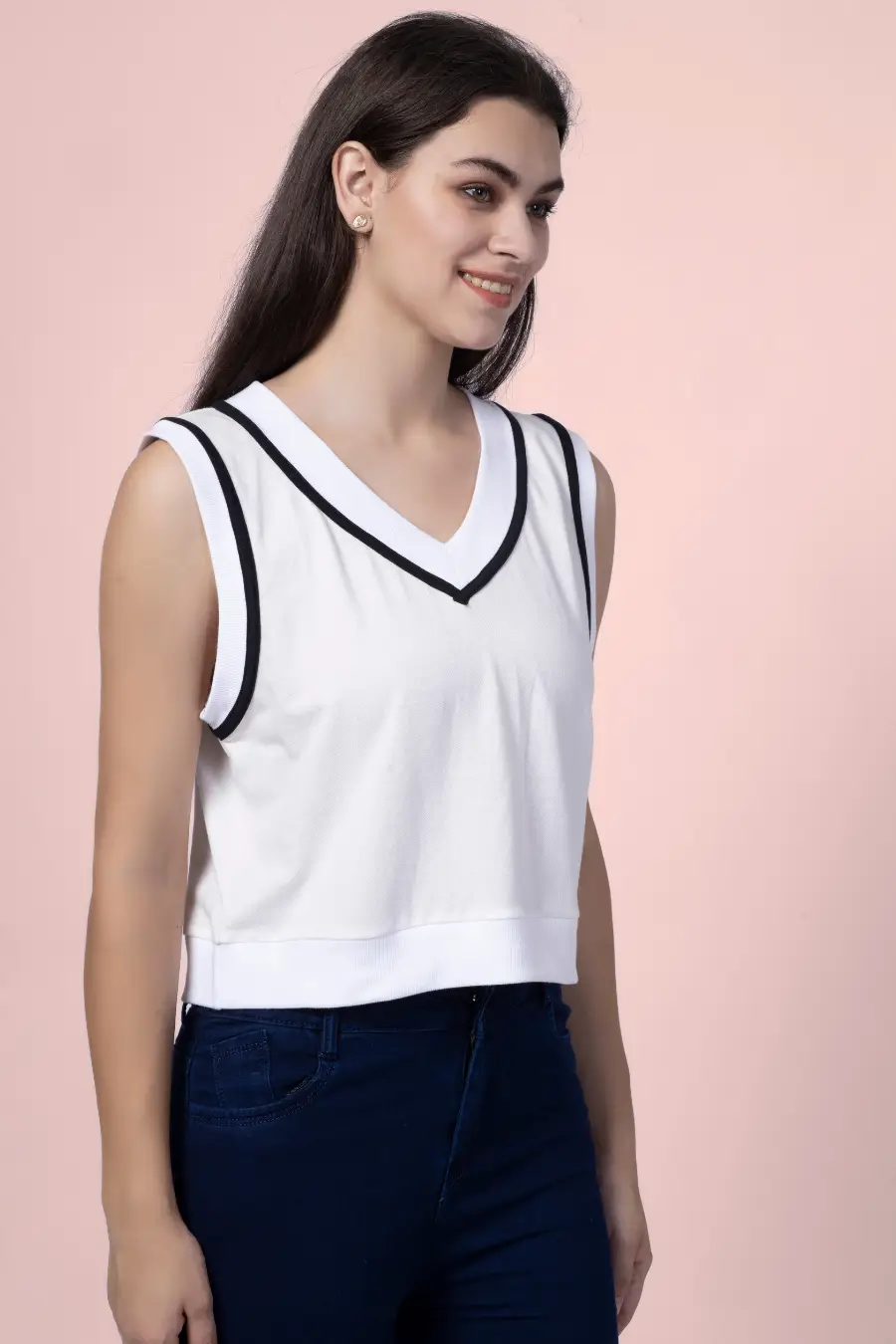 Side view of the 'Nadine' sweater vest, highlighting the V-neckline and sleeveless design. A perfect DIY project for a preppy and casual look.