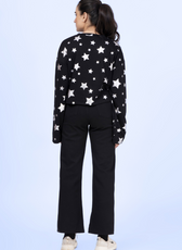 Back view of the Selena sweatshirt in black with silver stars, displaying the relaxed fit and long sleeves of this sewing pattern.