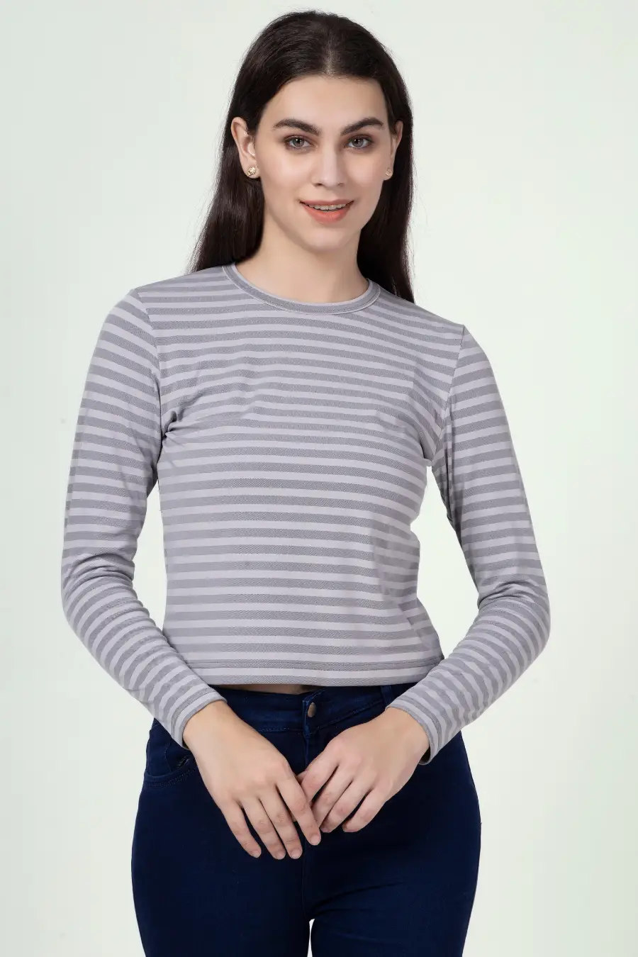 Front-facing view of a model in a striped long sleeve t-shirt from the 'Misha' sewing pattern. A wardrobe essential with a classic fit.